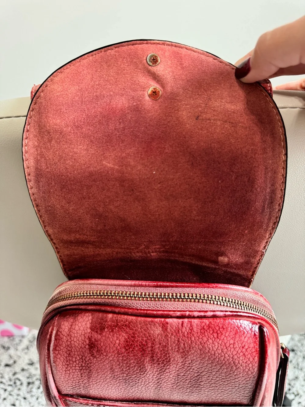 Distressed Circle Backpack With Red Flower lock Accent